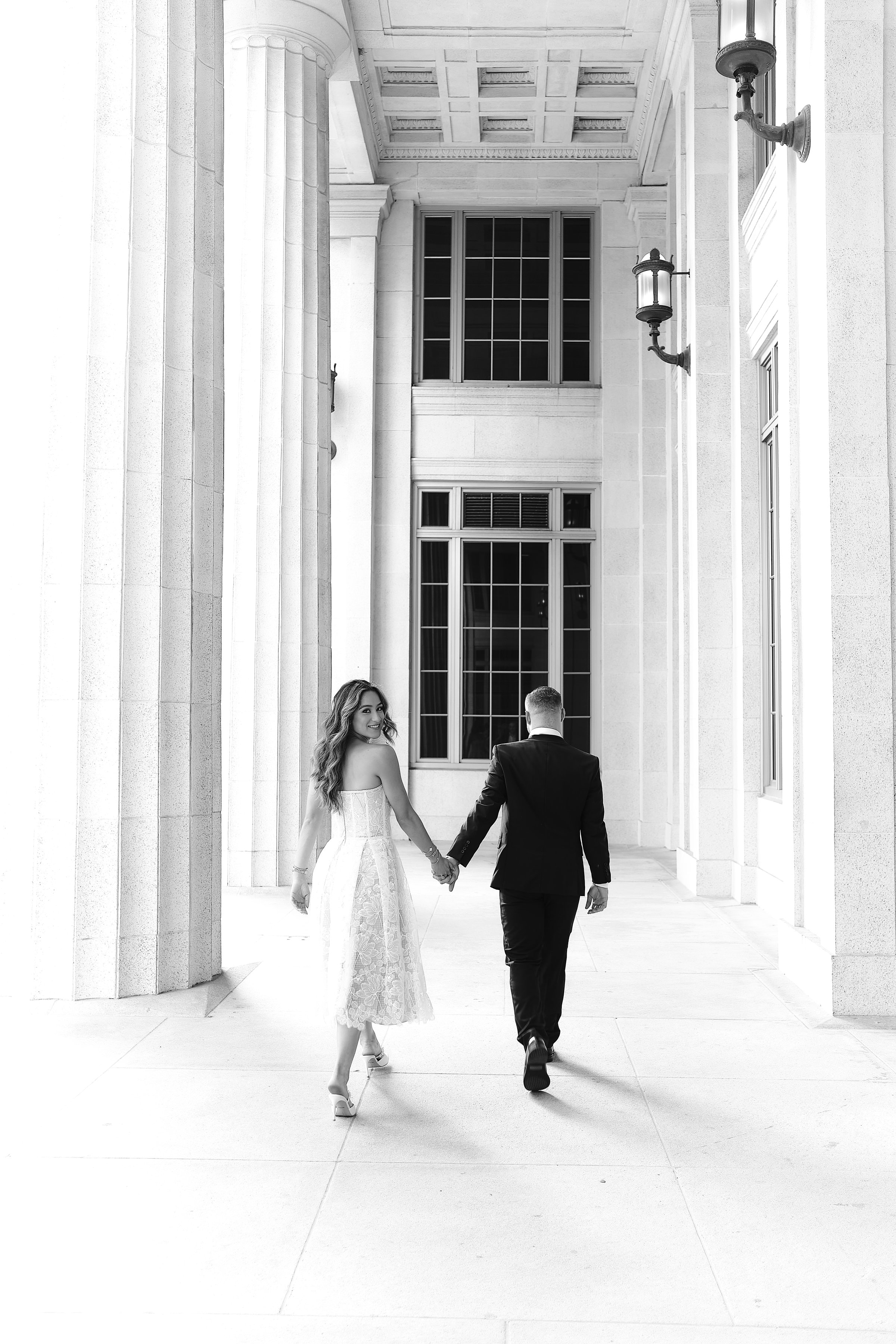 A black-and-white editorial wedding moment